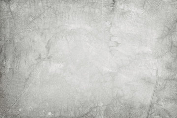 Old grungy texture, white grey color concrete cement wall with detail of rough stucco and crack for...