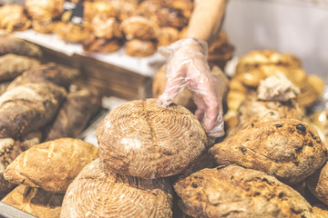 Baker choosing whole grain bread.