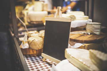 Agricultural fair stand with blank price board copy space.