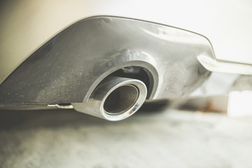 Low angle view of the exhaust pipe of a car