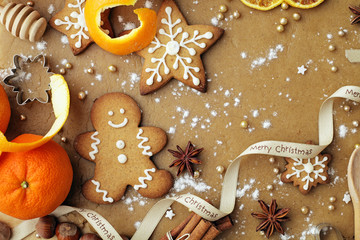 Fototapeta na wymiar baking of christmas cookies, decorative christmas gingerbreads and spices