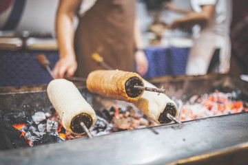 Preparation of the famous, traditional and delicious Hungarian Chimney Cake