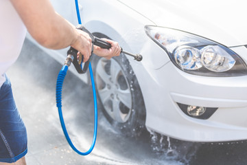 Self car washing by using high pressure water.