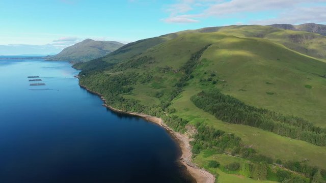 Aerial view of Loch Eil/Linnhe situated in landscape of Scottish Highlands, lush green hills and deep lake - panorama of Highlands of Scotland from above, United Kingdom, Great Britain, Europe