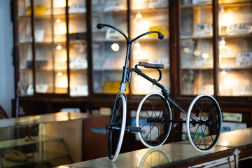 Small Old rusty kid bicycle retro style vintage