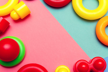 Colorful child kid’s education toys pattern background on the bright background. Childhood infancy children babies concept.