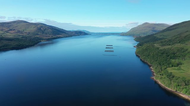 Aerial view of Loch Eil/Linnhe situated in landscape of Scottish Highlands, lush green hills and deep lake - panorama of Highlands of Scotland from above, United Kingdom, Great Britain, Europe