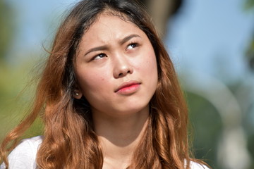 A Filipina Female Wondering