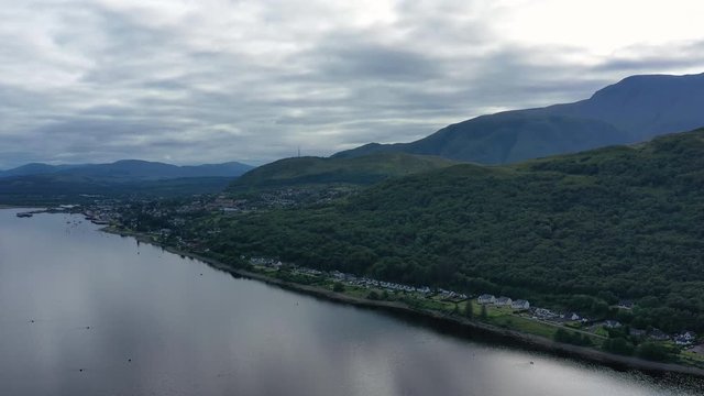 Aerial view of Loch Eil/Linnhe situated in landscape of Scottish Highlands, lush green hills and deep lake - panorama of Highlands of Scotland from above, United Kingdom, Great Britain, Europe