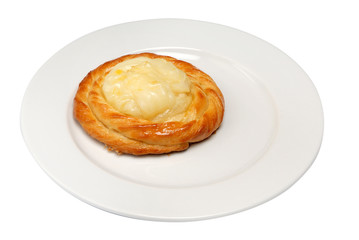 Buns with cottage cheese on plate on a white isolated background