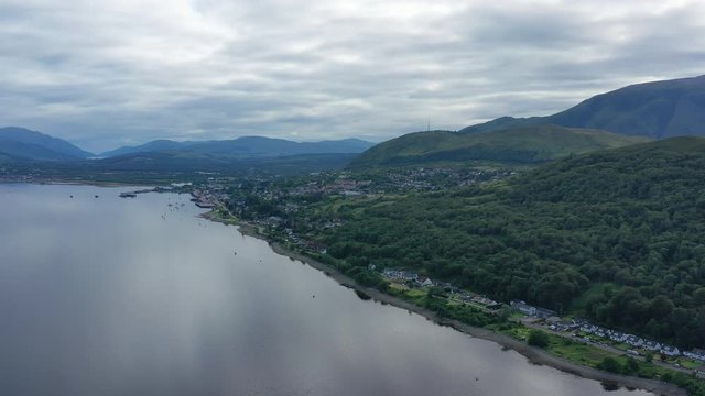 Aerial view of Loch Eil/Linnhe situated in landscape of Scottish Highlands, lush green hills and deep lake - panorama of Highlands of Scotland from above, United Kingdom, Great Britain, Europe