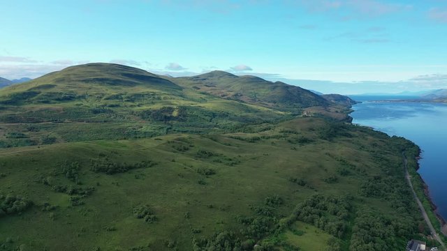 Aerial view of picturesque landscape of Scottish Highlands around Loch Eil/Linnhe, scenery with lush green hills - panorama of Highlands of Scotland from above, United Kingdom, Great Britain, Europe