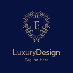 Premium monogram letter E initials ornate signature logotype. E Letter Gold luxury vintage monogram floral decorative logo