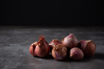 red onions on table.