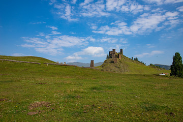 Ancient Svan towers on a background of mountains in Omalo, Tusheti, Georgia