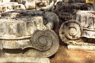 Parts of the destroyed stone columns in the archaeological museum of Epidaurus, Argolida prefecture, Peloponnese, Greece.
