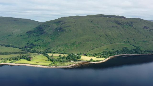 Aerial view of Loch Eil/Linnhe situated in landscape of Scottish Highlands, lush green hills and deep lake - panorama of Highlands of Scotland from above, United Kingdom, Great Britain, Europe