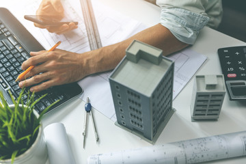 architect workplace - working on new house project in office