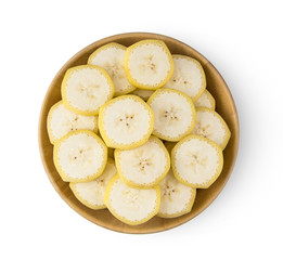 banana slice in wood bowl isolated on white background. top view
