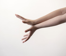 Hands and arms showing symbols holding pointing