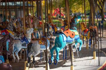 Beautiful Colorful old carousel in a National mall park in Washington, DC. Merry go round with...