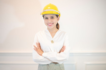 Engineer woman is smiling on white background