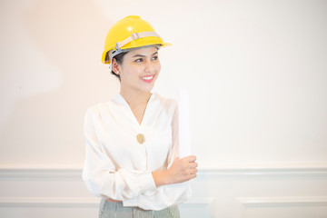Engineer woman is smiling on white background