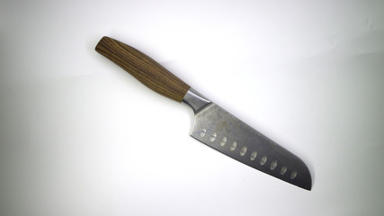 Chef's knife with wooden handle isolated on white background