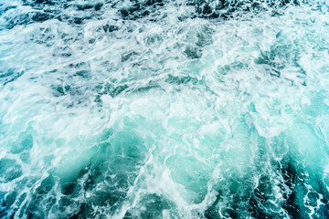 Fototapeta na wymiar Seething atlantic sea water with foam Cape Cod