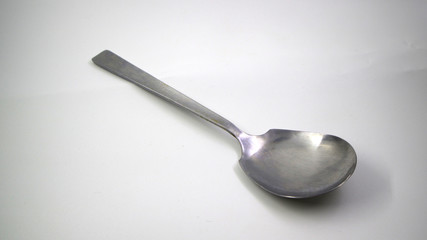 Metal kitchen soup ladle isolated on white background