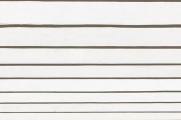 Obraz premium The background image is from a parallel, white-painted wooden boards.