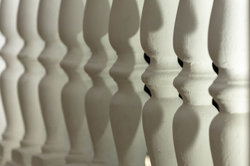 The background image is from a parallel, white, stone balusters of the stairs.