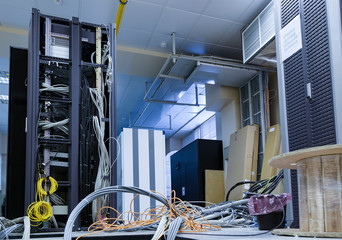 cable installation in the server room. Installation of equipment in a modern data center, a lot of...