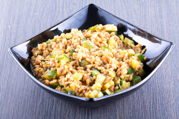 Rice with shrimps and zucchini, close up
