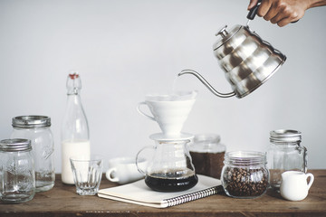 Drip coffee on a wooden bar White background