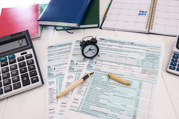 Clock with alarm on 1040 tax form