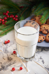 milk and cookies for Santa. holidays, celebration and home concept