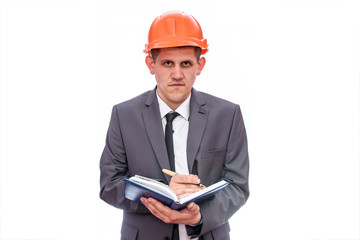 Man in suit and helmet with diary isolated on white