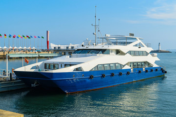 Fototapeta premium Luxury yacht moored in port, Qingdao, China