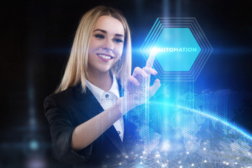The concept of business, technology, the Internet and the network. A young entrepreneur working on a virtual screen of the future and sees the inscription: Automation