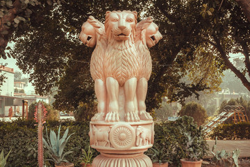 Lions on sculptured national emblem of India. Copy of the ansient Ashoka Pillar of Sarnath