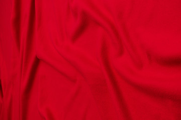 Red crumpled blanket, background, top view