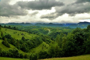 Naklejka na ściany i meble landscape with clouds in the Bucegi mountains