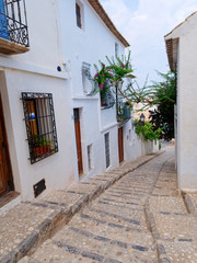 A beautiful street with beautiful white houses in Altea. Costa Blanca. Spain.