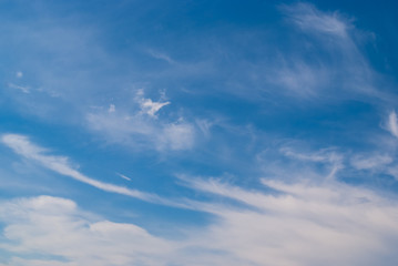 Blurred clouds, sky during in morning. Blue,white pastel heaven,soft focus lens flare sunlight.