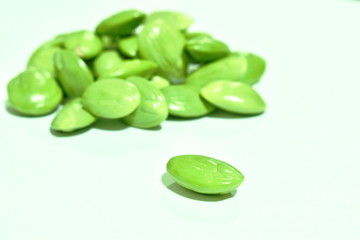 twisted cluster bean seed arranging on white background