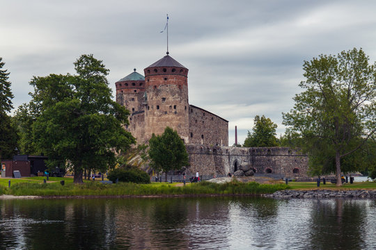 old Olavinlinna Olofsborg Castle in cloudy weather in Savonlinna, Finland