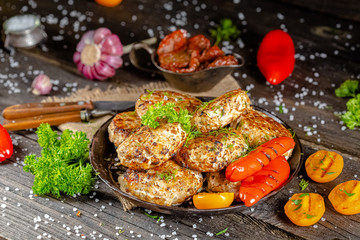 homemade meatballs, cutlets fried from red and white fish meat, in a vintage rustic bowl plate,...