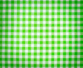 Green tablecloth with checkered pattern for background