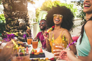 Happy woman smiling at the camera having fun with friends outdoor at the restaurant - Powered by Adobe